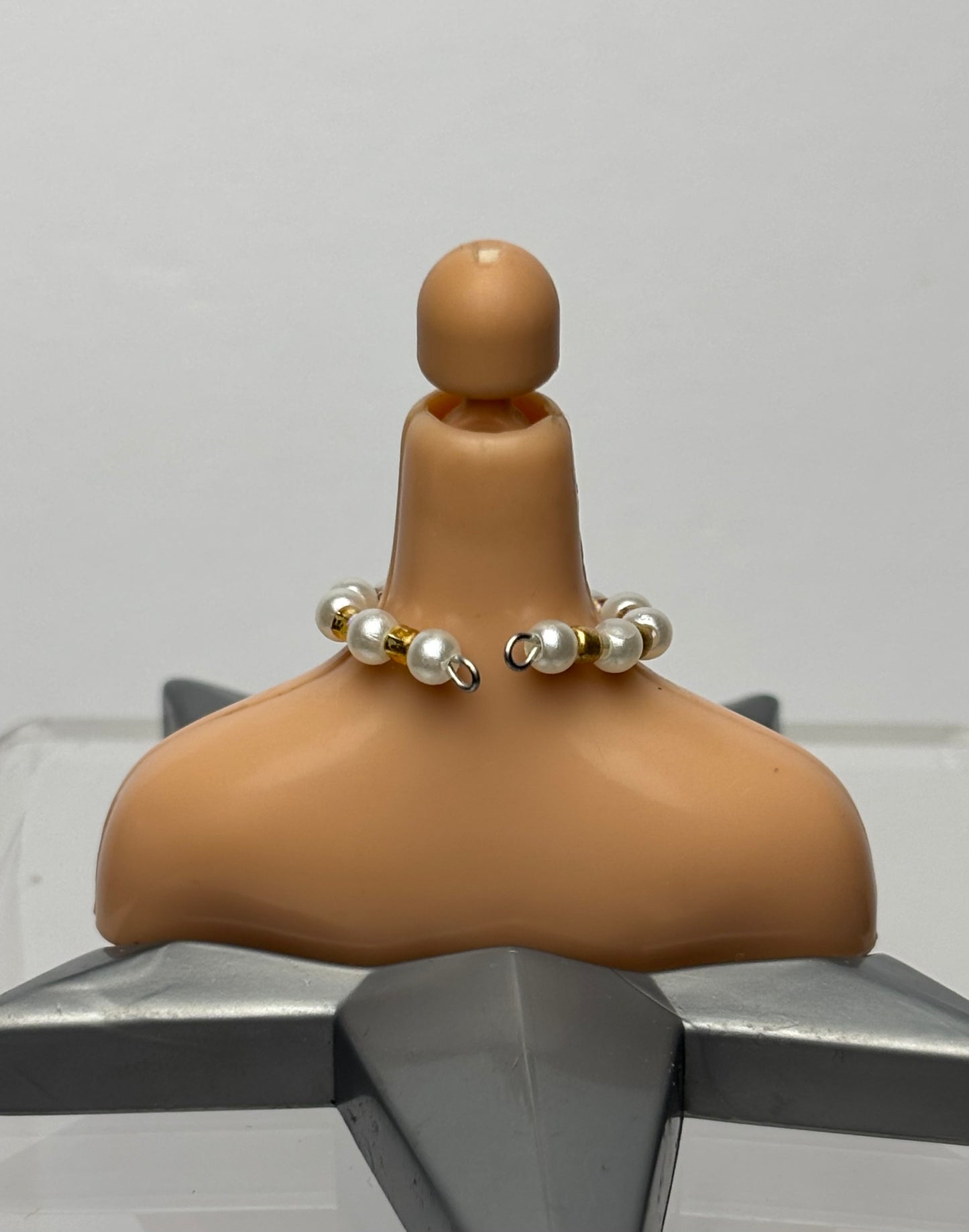 The Cross Pearl Necklace.