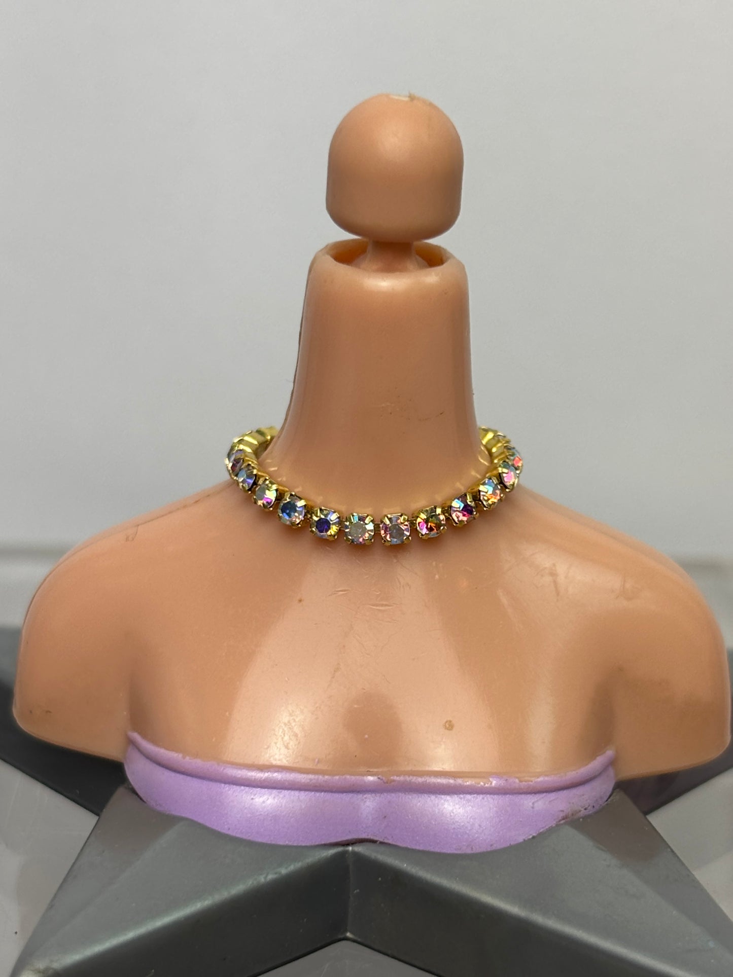 The Gold Necklace.