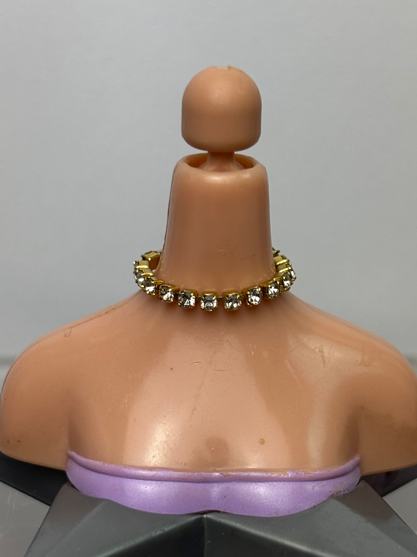 The Gold Choker.