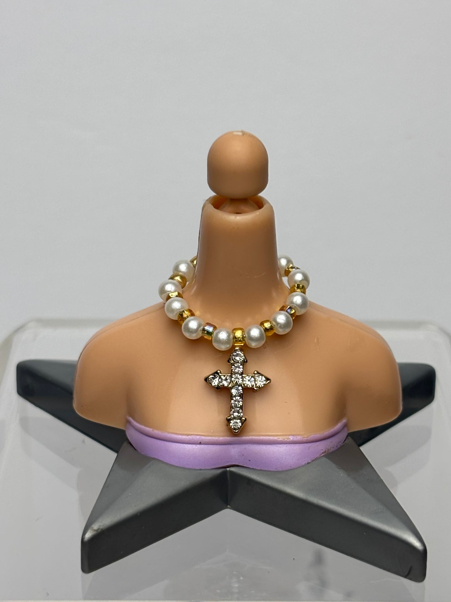 The Cross Pearl Necklace.