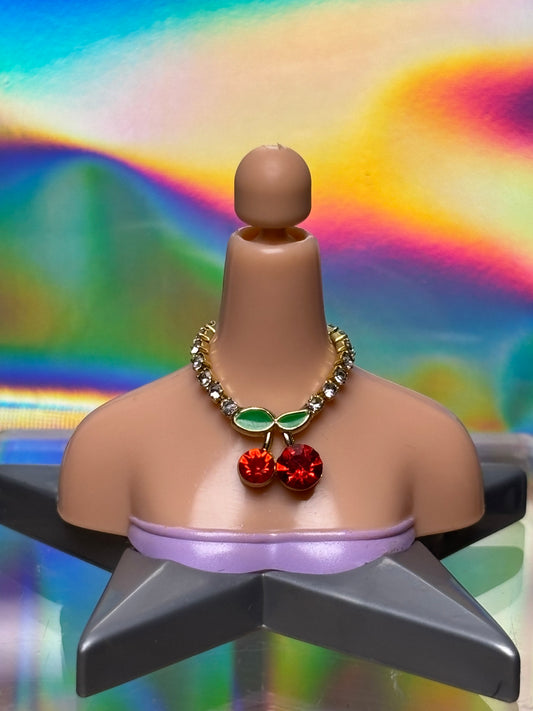 The Gold Cherry Necklace.