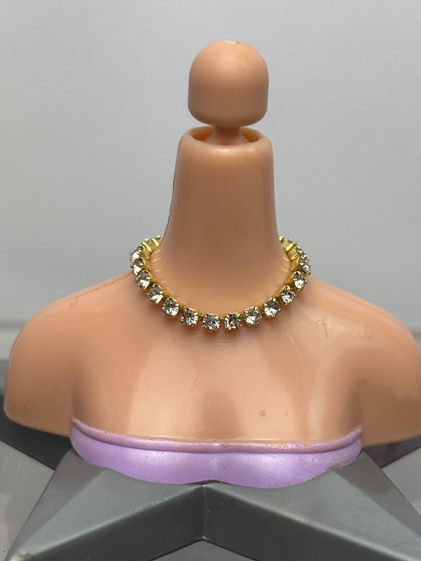 The Gold Necklace.